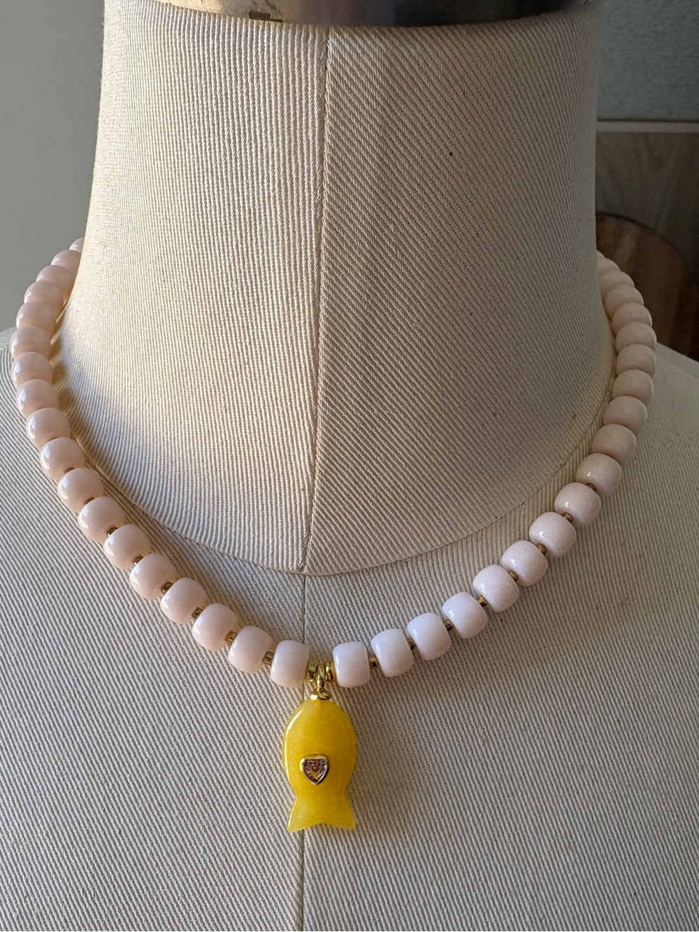 Anthropologie Light Pink Beaded Necklace with Yellow Fish Pendant